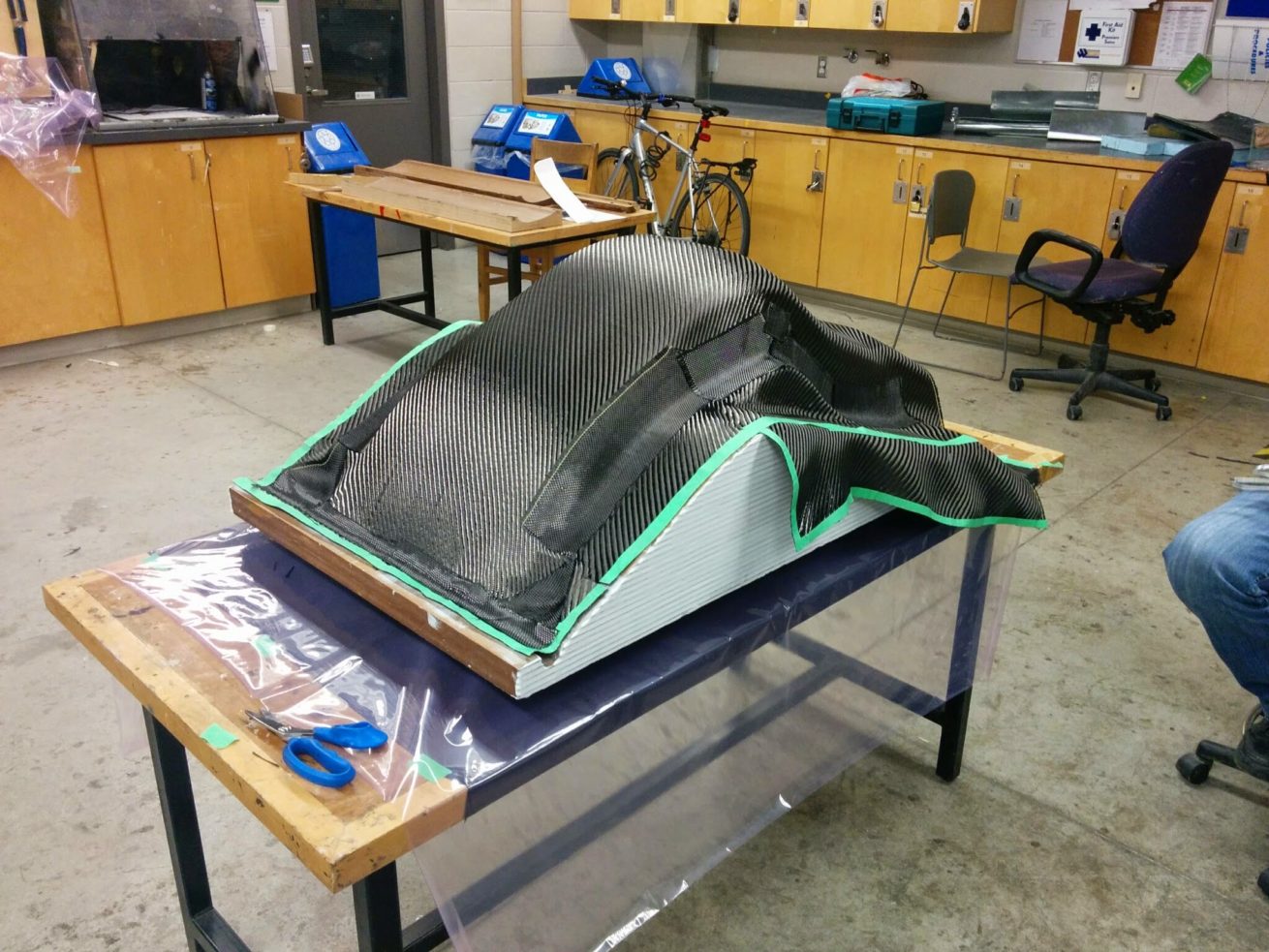 Seat Layup | Carbon-fibre laid up dry on mould