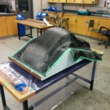 Seat Layup | Carbon-fibre laid up dry on mould